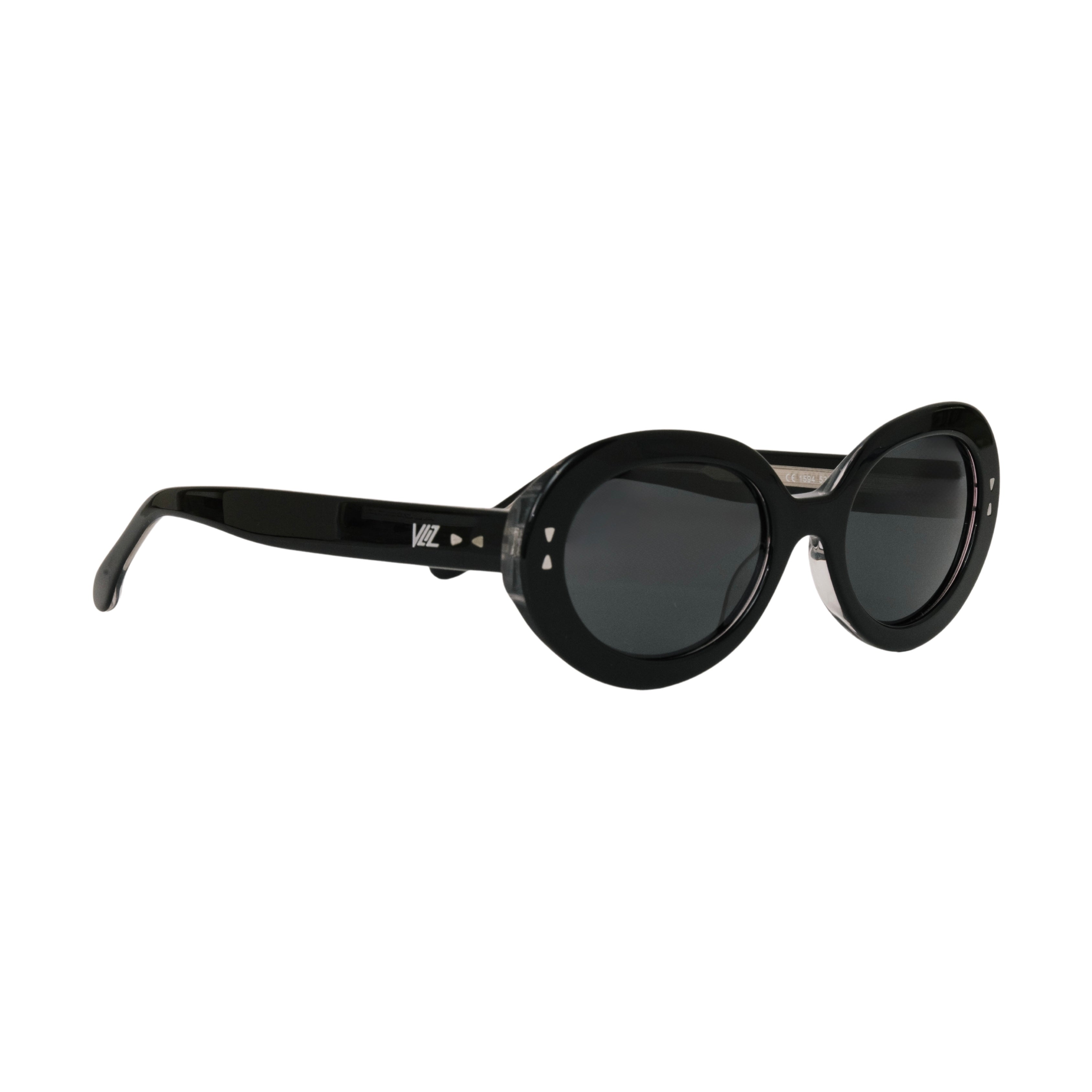 VLIZ Oracle sunglasses with a black wide oval frame, black lenses, retro styling, and engraved logo on temples.