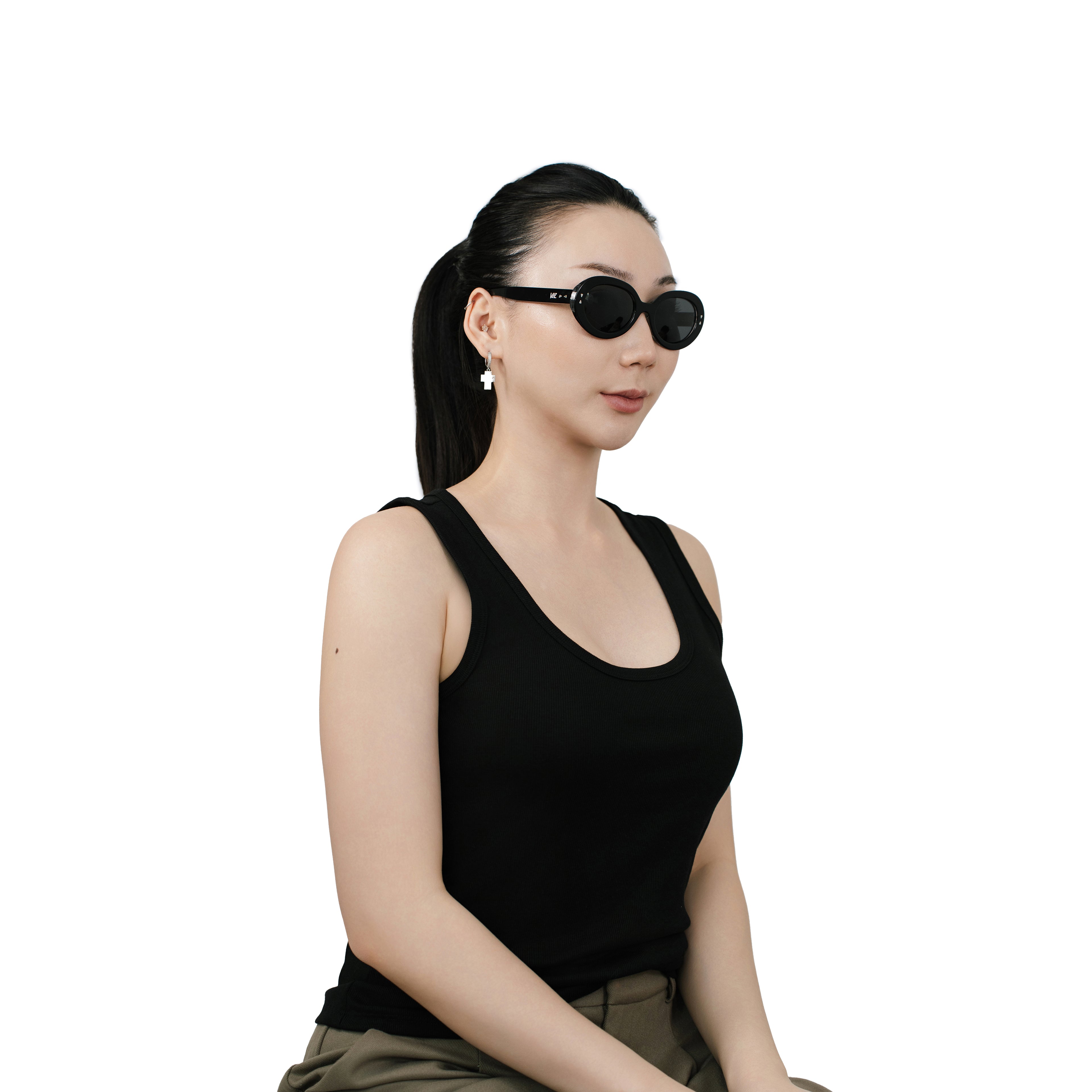 VLIZ Oracle sunglasses with a black wide oval frame, black lenses, retro styling, and engraved logo on temples.