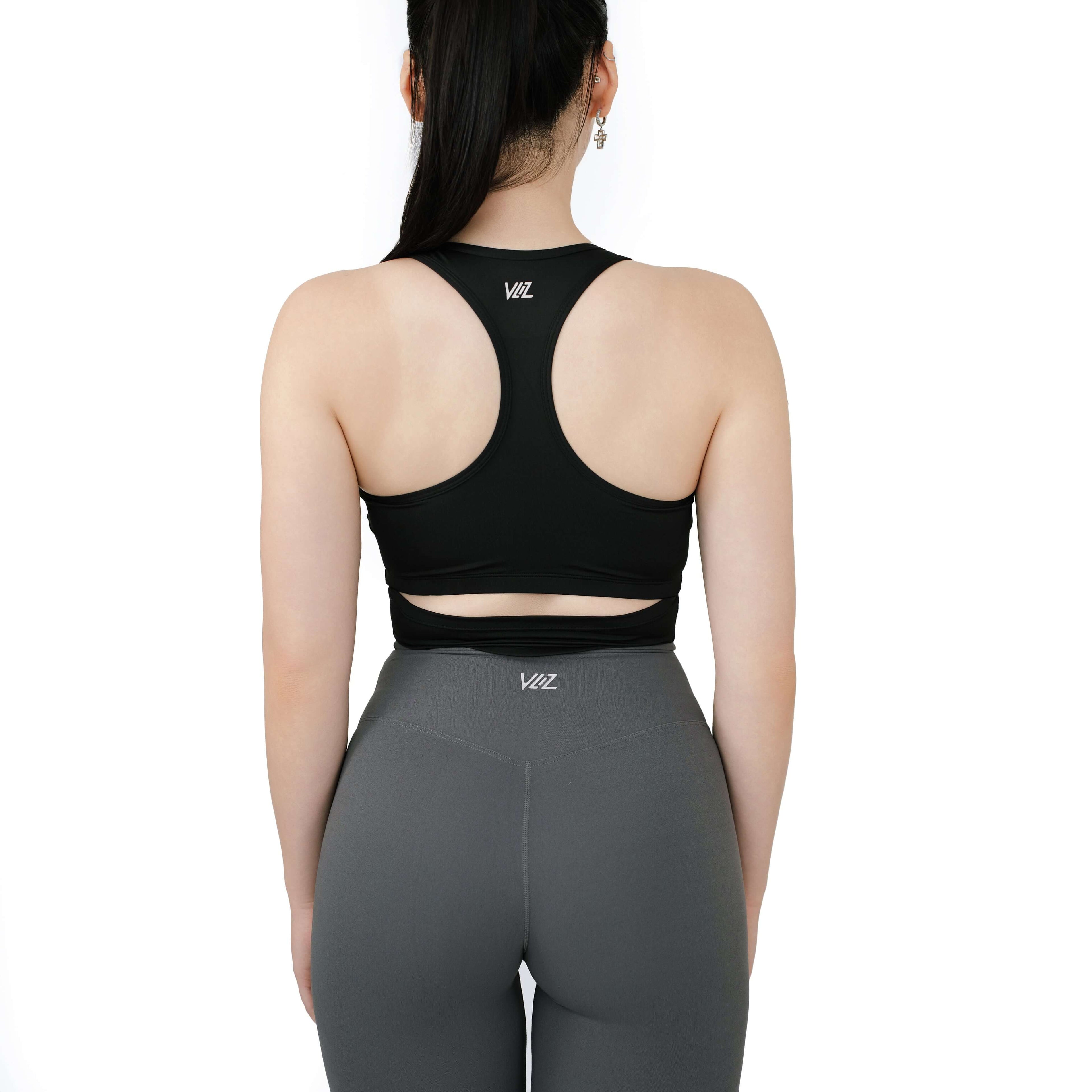 Full back view of VLIZ SculptFit Racerback Sports Bra in black, showcasing the racerback cut, curved lower band, and logo details at the upper back.