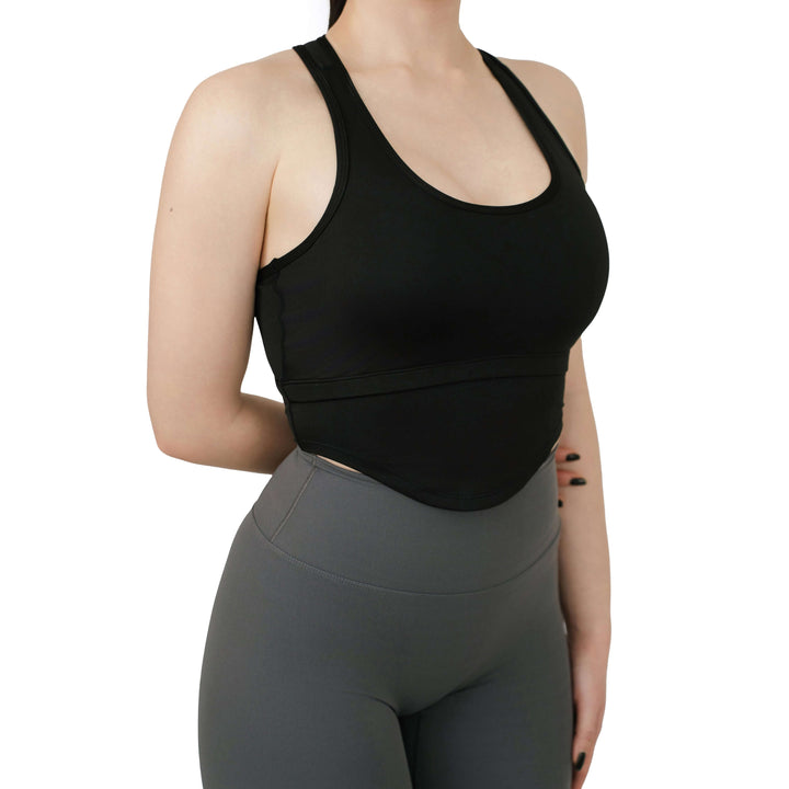Side profile close-up of VLIZ SculptFit Racerback Sports Bra in black, showing contoured compression fit and curved underbust seam.

