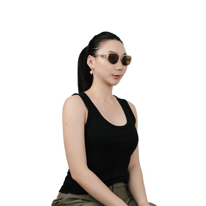 VLIZ Solace sunglasses with a brown square acetate-style frame and brown lenses, featuring sculpted edges, UV400 protection, and engraved logo on temples.