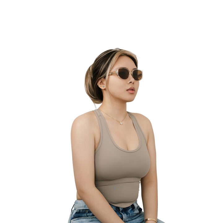 VLIZ Solace sunglasses with a brown square acetate-style frame and brown lenses, featuring sculpted edges, UV400 protection, and engraved logo on temples.