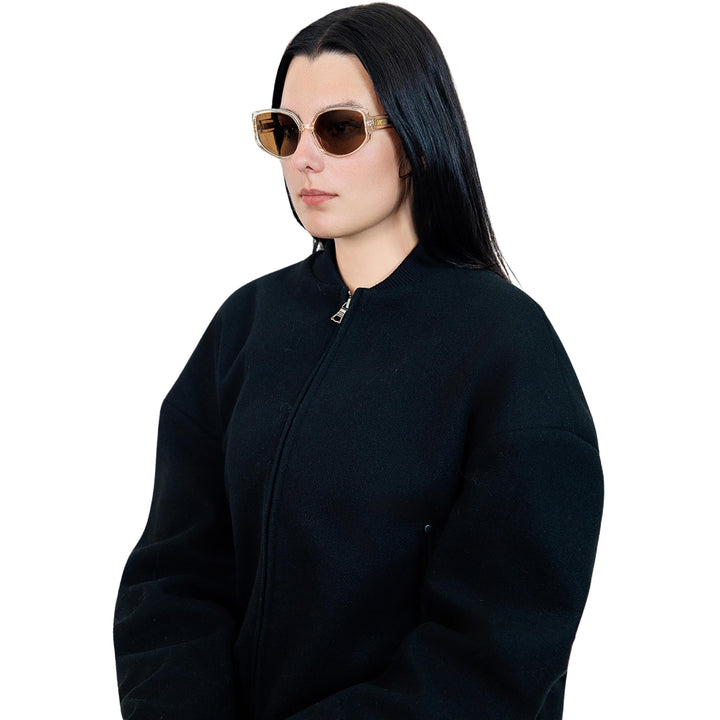 VLIZ Solace sunglasses with a brown square acetate-style frame and brown lenses, featuring sculpted edges, UV400 protection, and engraved logo on temples.