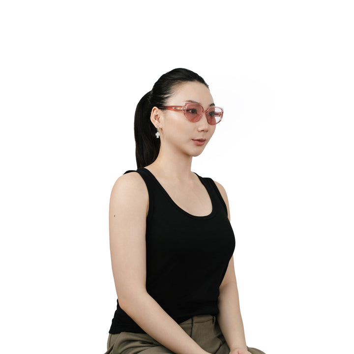 VLIZ Solace sunglasses with a pink square acetate-style frame and pink lenses, featuring sculpted edges, UV400 protection, and engraved logo on temples.
