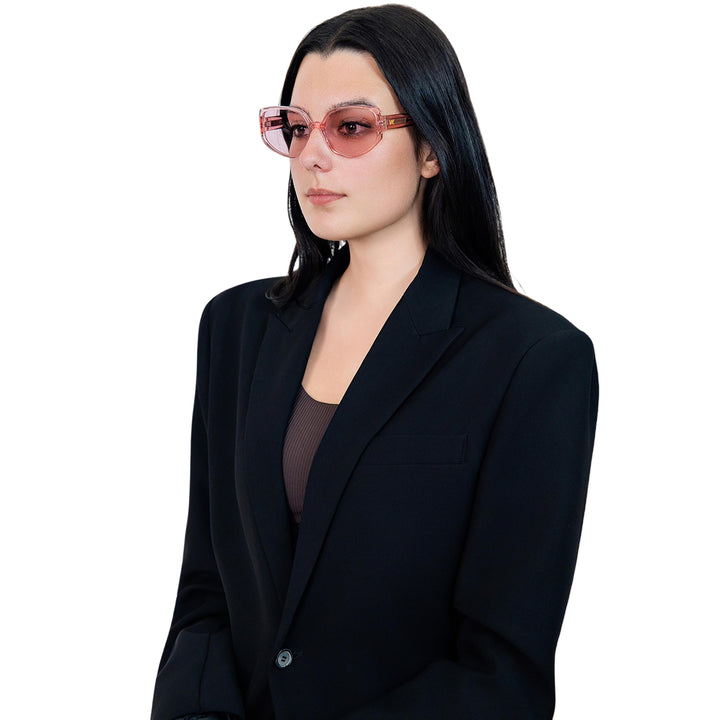 VLIZ Solace sunglasses with a pink square acetate-style frame and pink lenses, featuring sculpted edges, UV400 protection, and engraved logo on temples.