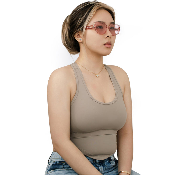 VLIZ Solace sunglasses with a pink square acetate-style frame and pink lenses, featuring sculpted edges, UV400 protection, and engraved logo on temples.