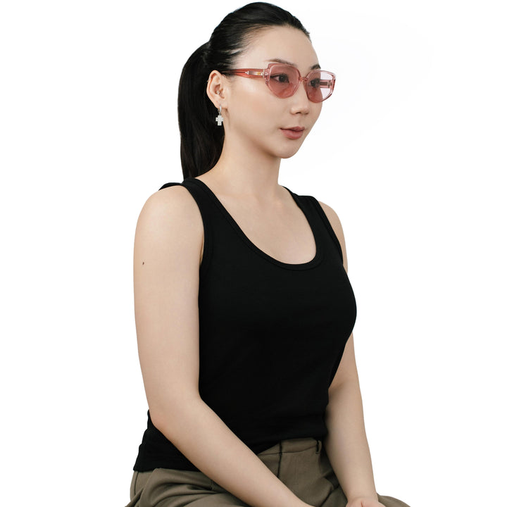 VLIZ Solace sunglasses with a pink square acetate-style frame and pink lenses, featuring sculpted edges, UV400 protection, and engraved logo on temples.
