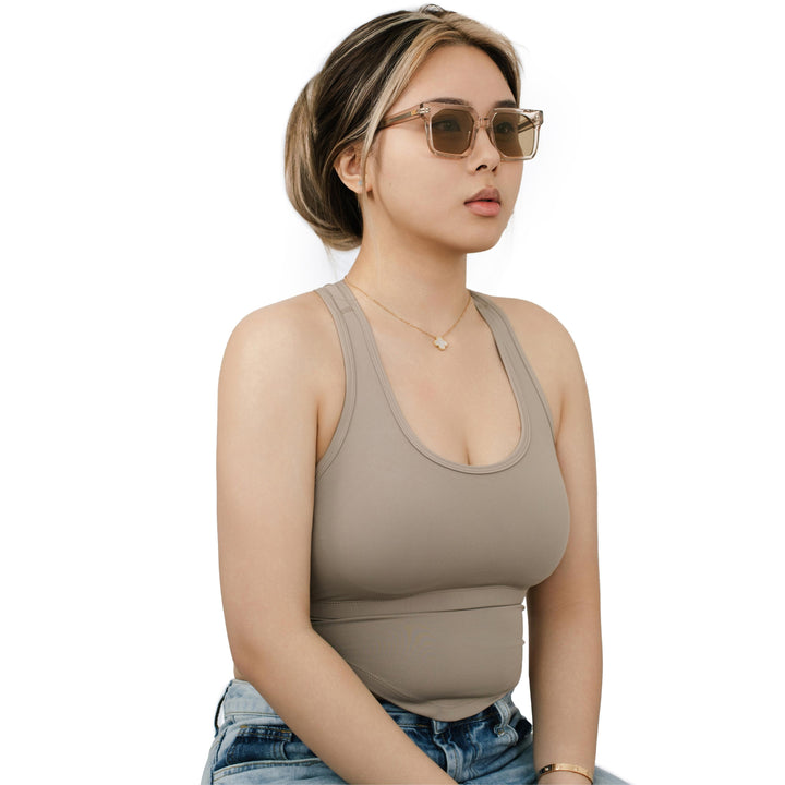 VLIZ Strata sunglasses with a translucent or tortoise square-edge frame and brown lenses, featuring a sculpted urban design, UV400 protection,and engraved logo on temples.