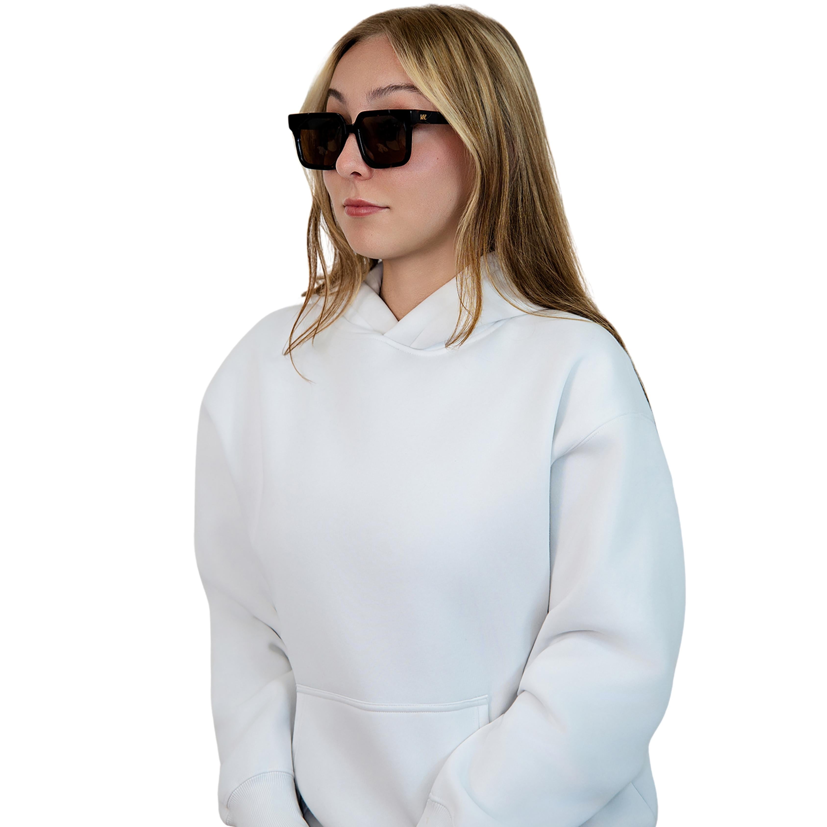 VLIZ Strata sunglasses with a translucent or tortoise square-edge frame and brown lenses, featuring a sculpted urban design, UV400 protection,and engraved logo on temples.