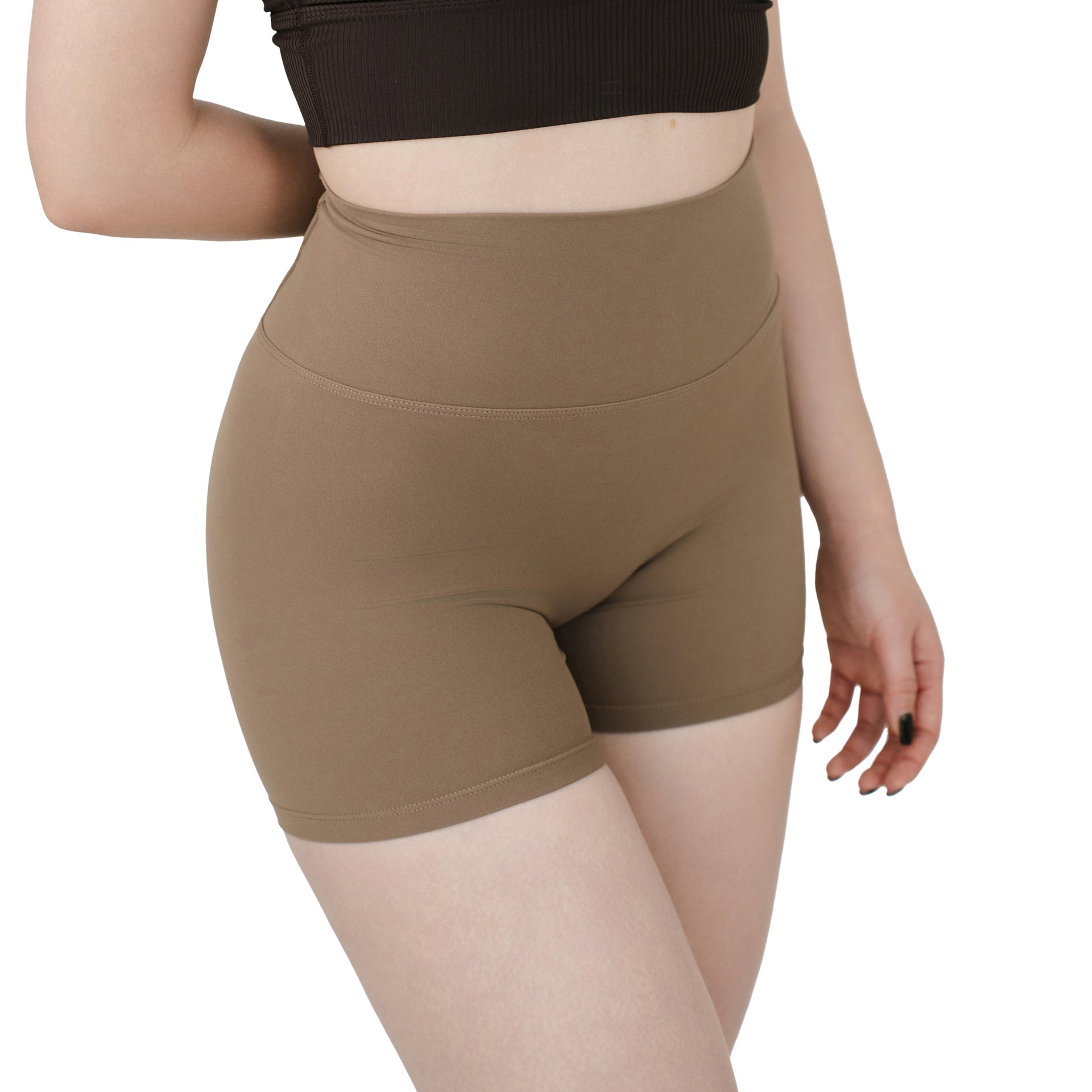 Front-side view of VLIZ Ultra Soft SculptFit Short Leggings in Light Brown, featuring a high-rise waistband, smooth stretch fabric, and above-the-knee length.