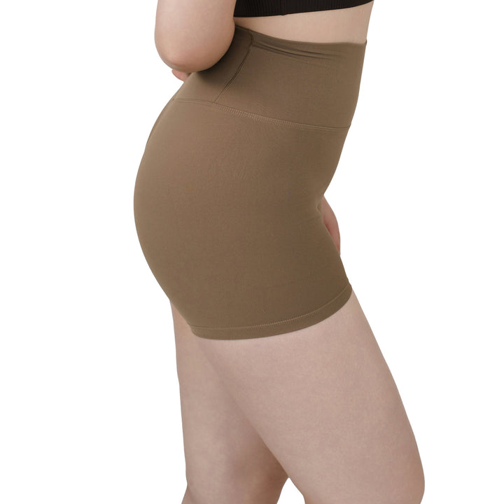 Side view of VLIZ Ultra Soft SculptFit Short Leggings in Light Brown, highlighting high waist support, smooth compression, and seamless leg opening.