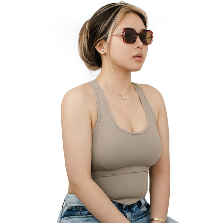 VLIZ Vista sunglasses with pink translucent square-edge frame and brown lenses, designed with a relaxed silhouette and engraved logo on temples