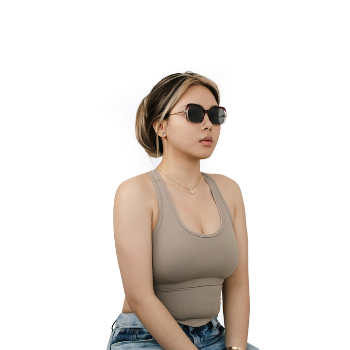 VLIZ Vista sunglasses with red translucent square-edge frame and black lenses, featuring softened angles, gradient styling, and engraved logo on temples.