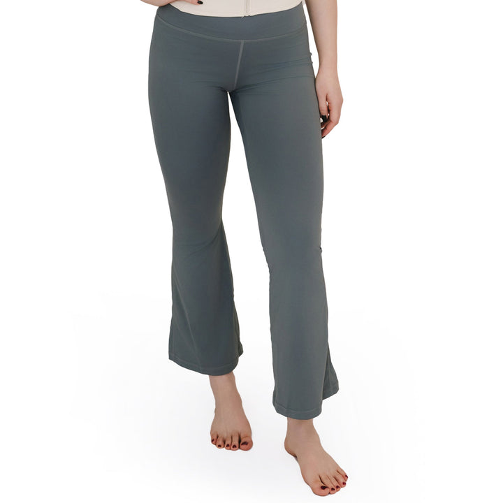Close-up of VLIZ High-Rise Sculpting Flare Leggings in gray, showcasing the lower half fit and flared hem.